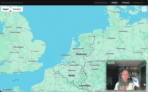 Google Maps controlled with hand gestures via webcam: panning, zooming, and rotating using fist and pinch gestures.